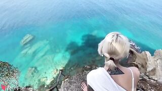 A cute girl passionately sucks dick on the ocean shore, brought by the wind