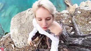 A cute girl passionately sucks dick on the ocean shore, brought by the wind
