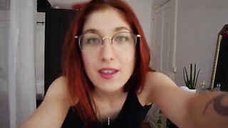 Redhead amateur Trish Collins tries on sexy lingerie and gets horny