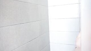 A hot girl has sex in the shower with a toy