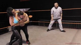 Nadia White, the busty brunette, dominates her opponent in a fierce match