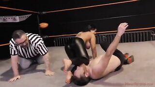 Nadia White, the busty brunette, dominates her opponent in a fierce match