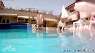 A stunning blonde babe gets her big ass oiled on vacation