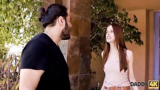 A slender ginger girl calmed down after a quarrel with her boyfriend