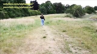 A girl is fucking with a guy in the park and he cums on her face