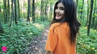 A girl is walking in the forest and meets a guy to have sex