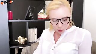A secretary is having fun with her boss in various poses, getting wild