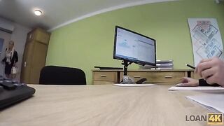 A business lady is trying to get a loan from the bank