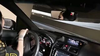 Slutty chick sucks cock in the car on the parking lot