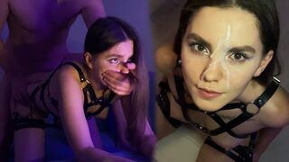 A hot brunette girl has sex while wearing a harness and gets cum on her face