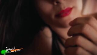 A stepmom with red lips makes a cock sucking video for you