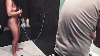 A hot brunette gets her dick washed down the drain in the shower
