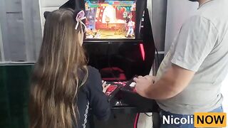 A cute and petite girl, Nicoli Now, tries to pass the level in a difficult game