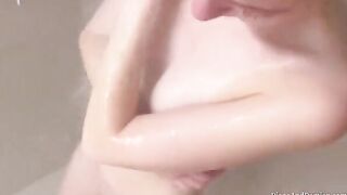 We shower, massage each other, and have sex over the couch in an intimate, real couple scene