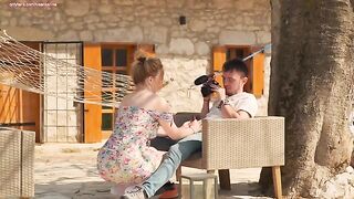 A daring outdoor encounter with a neighbor in a rural setting