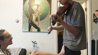 The couple was trying to practice violin but couldn’t control passion