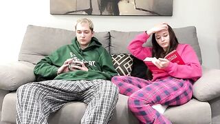 Stepbrother masturbating next to his step sister on the couch, until she gives him a handjob