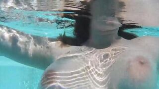 Babe Alia testing a new dildo in the pool, alone and horny