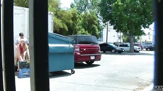 Girl has sex behind the garbage tank, unaware of being watched