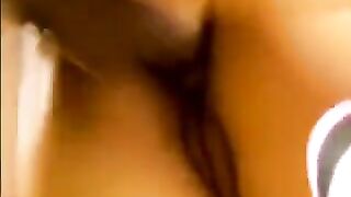 An Asian woman was fucked by two guys at her home in a steamy encounter