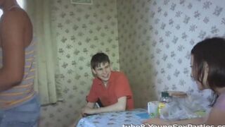 Foursome sex of two couples at a friend's home party