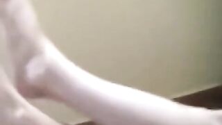 A naked girl has a smoke and gets burned