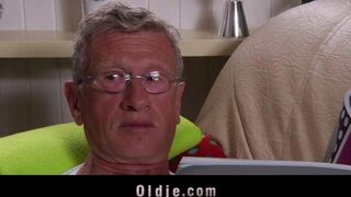 A hot blonde is getting excited by older guys in this steamy scene