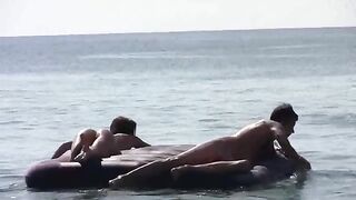 Nude beauties have sex on the sandy beach