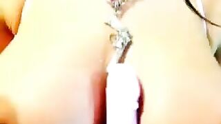 A girl with a great figure fucks herself in all holes on the webcam