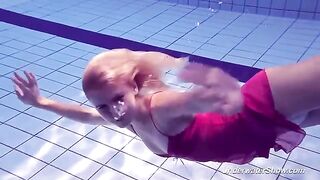 Babe Helen has a swim in the pool without clothes