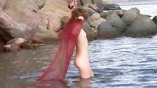 A sexy girl has small wet boobs, but she doesn’t mind