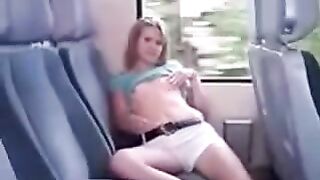 On the bus, in the back seat, ironing her pussy through panties