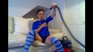 Girl uses a vacuum cleaner to achieve orgasm