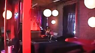 A sexy black woman in a latex suit rides with passion and intensity