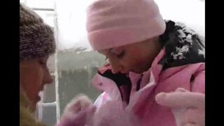 Lesbians are having fun on a cold and snowy day