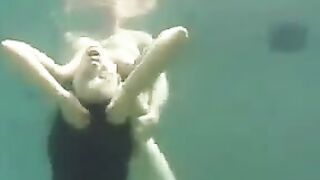 Sex on the coast of the ocean with a busty brunette