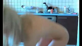 The young guy masturbates the virgin in the kitchen