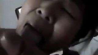 An experienced Chinese woman teaches her guy how to perform a blowjob