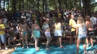A young girl is fucking in the forest with a guy in this video