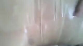 You need to put a condom on the dick before jerking off, not after
