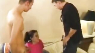 A depraved young nanny has anal sex with two guys in a threesome