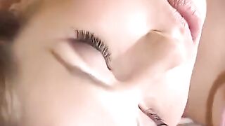 A busty woman licks the pussy of a young man in this hot video