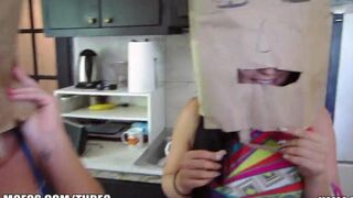 The girls wear on their heads bags from shopping - an unusual sex
