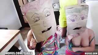 The girls wear on their heads bags from shopping - an unusual sex