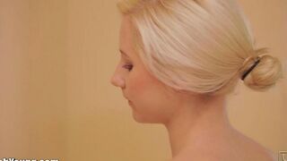 Girl caresses her pussy with a brush and brings herself to orgasm