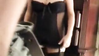 A sexy brunette in stockings fucks with her husband at home