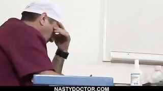 The doctor expanded the pussy of a patient with a speculum
