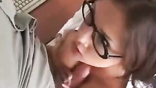 The girl is fucking with her boss in the office of his company