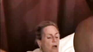 A mature woman is fucked by a black guy’s huge cock