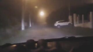 A sexy woman was exercising when a strange figure appeared